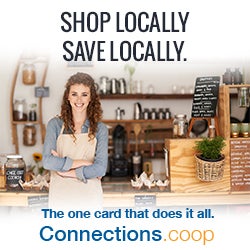 SHOP LOCALLY, SAVE LOCALLY. The one card that does it all. Connections.coop - Beverage shop employee standing at the shop's counter.