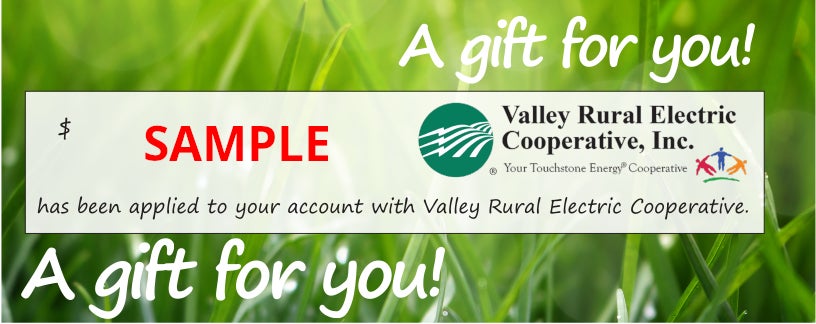 A sample everyday gift certificate depicting a close-up of blades of grass and the phrase: A gift for you!